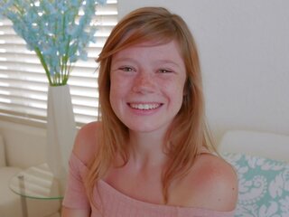 Charming Teen Redhead with Freckles Orgasms During Casting