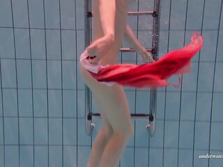 Hungarian enchantress Dona enjoys being naked in the pool