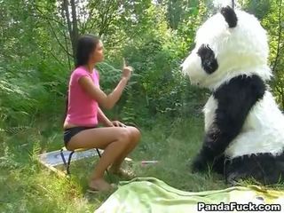 X rated video in the woods with a huge toy panda