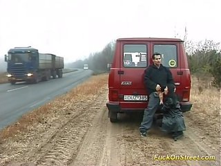 Lustful harlot sucks dick on the road